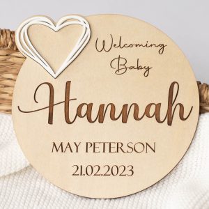 Welcoming Baby and Heart Birth Announcement Disc engraved with the name Hannah and a date of birth.