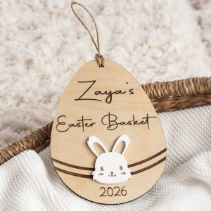 Personalised Easter basket disc made from birch wood, engraved with a child’s name and year, featuring a white acrylic bunny.