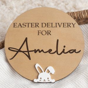 Round wooden Easter delivery disc engraved with a child’s name and finished with a white acrylic bunny detail.
