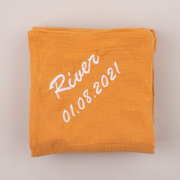 Personalised Yellow Mustard Organic Muslin Wrap personalised with the name River