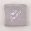 Personalised Grey Organic Muslin Wrap personalised with the name Olivia