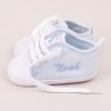 Personalised Blue Baby Shoes embroidered with the name Noah using blue thread.