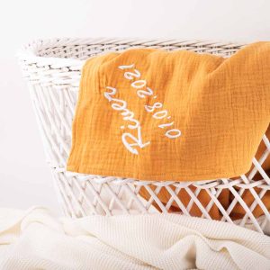 Mustard Organic Muslin Personalised Swaddle Wrap with Baby basket.