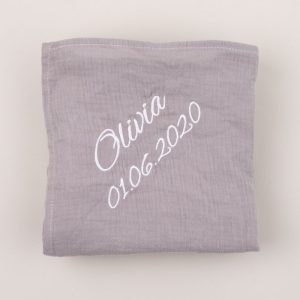 Personalised Grey Organic Muslin Wrap personalised with the name Olivia.