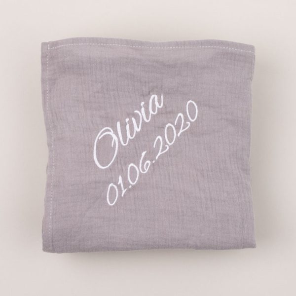 Personalised Grey Organic Muslin Wrap personalised with the name Olivia.