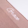 Blush Pink Knitted Baby Blanket Close Up Close up of white embroidered script name on blush pink knitted personalised baby blanket showing stitch detail.