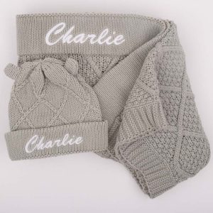 Green Sage knitted diamond blanket and matching bear ear beanie embroidered with name Charlie.