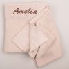 Personalised Beige Knitted Blanket with the name Charlie embroidered.