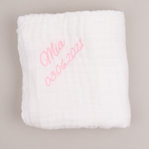 Large white muslin baby's blanket folded and personalised in pink Mia