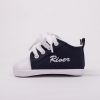 Personalised navy blue baby shoes embroidered with the name River