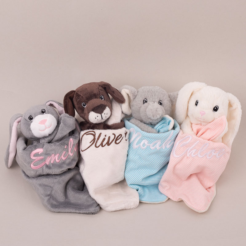 Four baby comforters gifts for babies embroidered with baby names.
