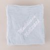 Personalised Light Blue Organic Muslin Wrap personalised with the name Maddison.
