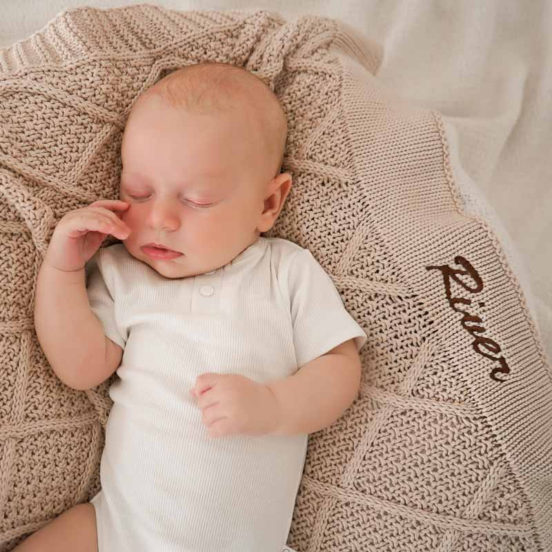 Personalised Beige Baby Blanket Diamond Knitted embroidered with Brush Script font.