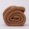 Personalised Brown Knitted Blanket for baby boys rolled up.