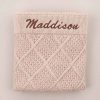 Personalised Beige Diamond Knitted Blanket Embroidered with Maddison using brown thread.