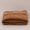 Folded Brown Diamond Personalised Baby Blanket embroidered with the name Blake Edward.