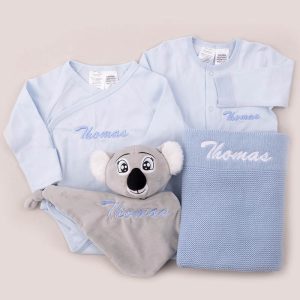 A 4-Piece Gift Box including a 100% GOTS Organic Blue Baby Romper & Onesie, Comforter & Knitted Blanket embroidered with a name.