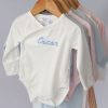 A Line-Up of100% GOTS Certified Organic Baby Rompers with Personalised Embroidery.