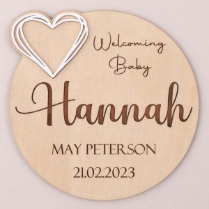 Welcoming Baby and Heart Birth Announcement Disc engraved with the name Hannah and a date of birth.
