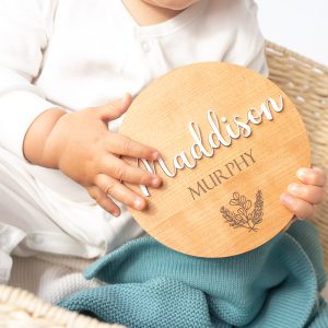 Baby holding 3D Birth Announcement Name Disc – Dark