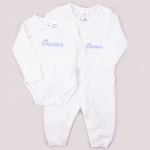 Personalised white baby romper and onesie newborn gifts.