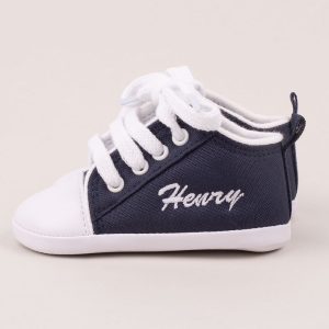 Personalised Navy Blue Shoes personalised with the name Henry using white thread.