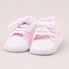 Pink Baby Girl Shoes with shoes laces tied.
