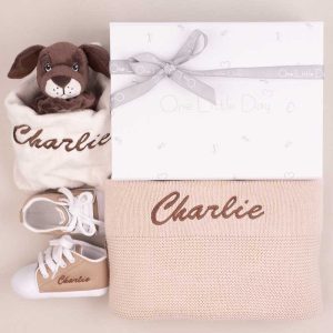 Baby Gift - Beige Knitted Blanket, Puppy Comforter and Shoes personalised with the name Charlie with brown embroidery thread.