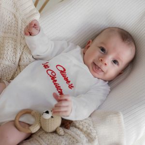 Personalised 1st Christmas Baby Romper and Reindeer Rattle Gift.