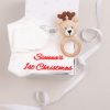 Personalised 1st Christmas Baby Romper and Reindeer Rattle with box and ribbon.