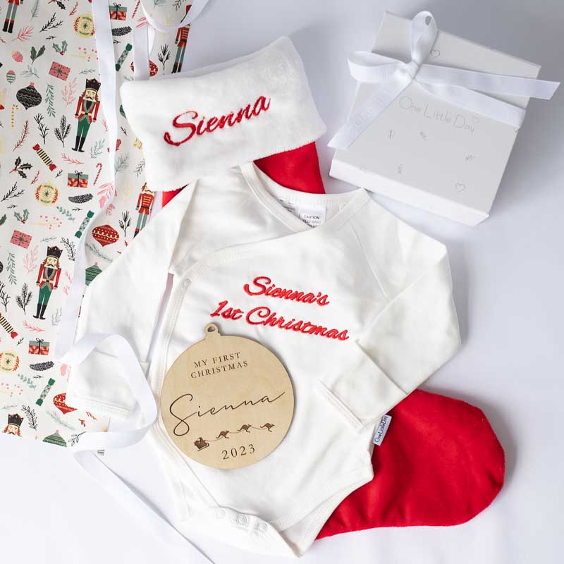 Personalised My First Christmas baby gifts with and ribbon.