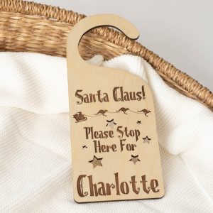 Santa Please Stop Here For Personalised Door Hanger engraved with girls name Charlotte.