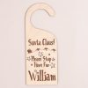 Santa Please Stop Here For Personalised Door Hanger engraved with boys name William.