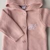 Close Up of a Blush Pink Baby Cardigan with the letter H embroidered.