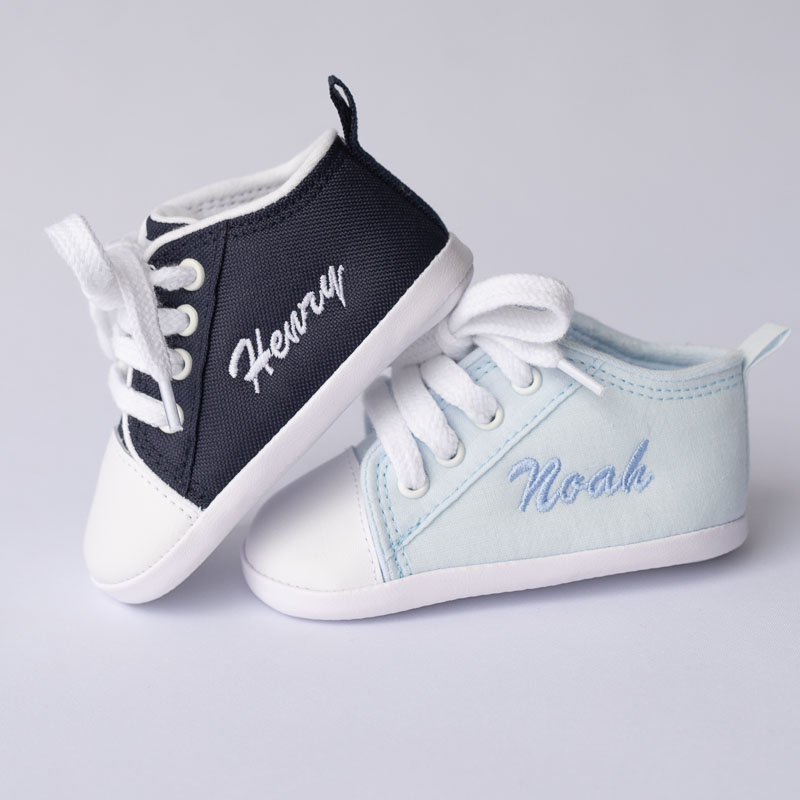 Personalised navy baby shoes and light blue baby boy shoes with name embroidery.