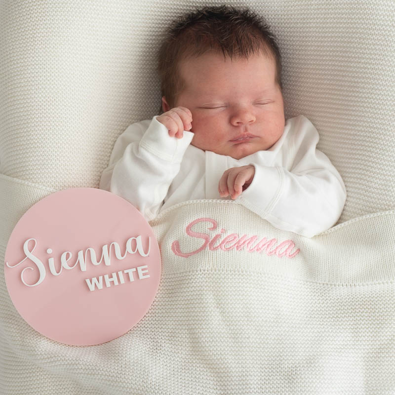 Personalised white knitted blanket and birth announcement disc newborn girl gift ideas.