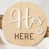 Hes Here Birth Announcement Disc A birth wood birth announcement disc that says "He's Here" with a heart in white acrylic overlayed.