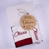 Burgundy Christmas Baby Hat, Stocking & Disc Gift Box Burgundy personalised baby Christmas hat, stocking and wooden My First Christmas disc set displayed in open One Little Day gift box with white ribbon bow.