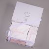 Light Pink Christmas Stocking & Hat Baby Gift Box Light pink personalised baby Christmas stocking and hat set folded side by side in open One Little Day gift box with white ribbon bow.
