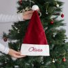 Personalised Burgundy Christmas Hat Olivia Personalised Burgundy velvet Santa hat with white cuff and Olivia embroidered in Burgundy with pom pom.