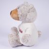Personalised Christmas Teddy & Jumper Side Side profile of grey plush personalised Christmas teddy bear wearing a white knitted jumper with burgundy embroidered script name on white background.