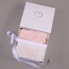 Pink Baby Christmas Hat Gift Box Pink personalised baby Christmas hat folded in open One Little Day gift box with white ribbon bow.