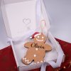 Gingerbread Man Christmas Keepsake Giftbox Personalised wooden gingerbread man Christmas ornament with Olivia engraved and red Santa hat presented in a One Little Day gift box