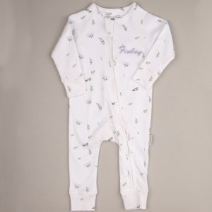 White baby onesie with koala and leaf pattern, front zipper, and embroidered name ‘Finley.’