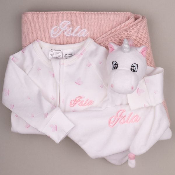 Pink Baby Blanket Unicorn Comforter Butterflies Onesie Soft pink-and-white baby gift set with personalized blanket, onesie, and unicorn comforter embroidered with the name βIsla.β