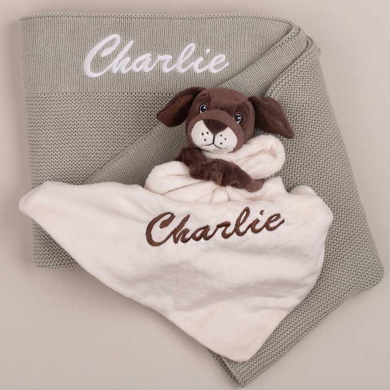 Sage knitted baby blanket with personalised puppy comforter.