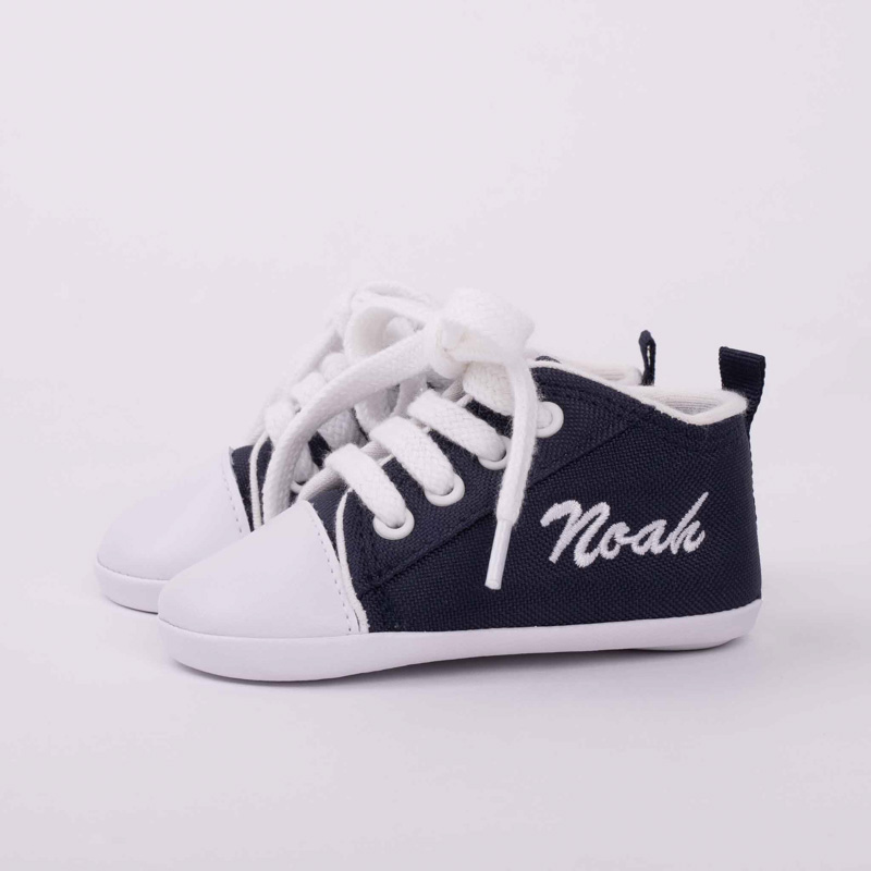 Navy personalised baby shoes with white laces.