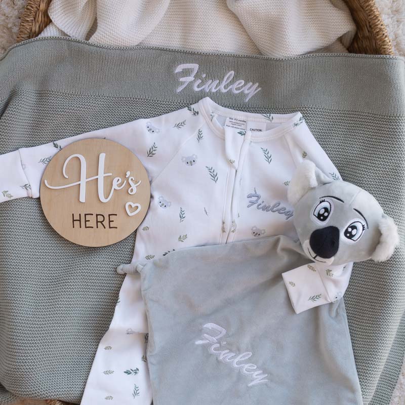 Sage personalised baby gift set with koala onesie and announcement disc.