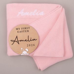 Pink Knitted Blanket And Easter Disc.