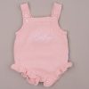 Pink Frilly Baby Girl Knitted Romper Ruby create alt text for the image attached in less than 20 words.